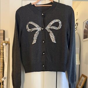 Chic Black Cardigan with Sequin Bow